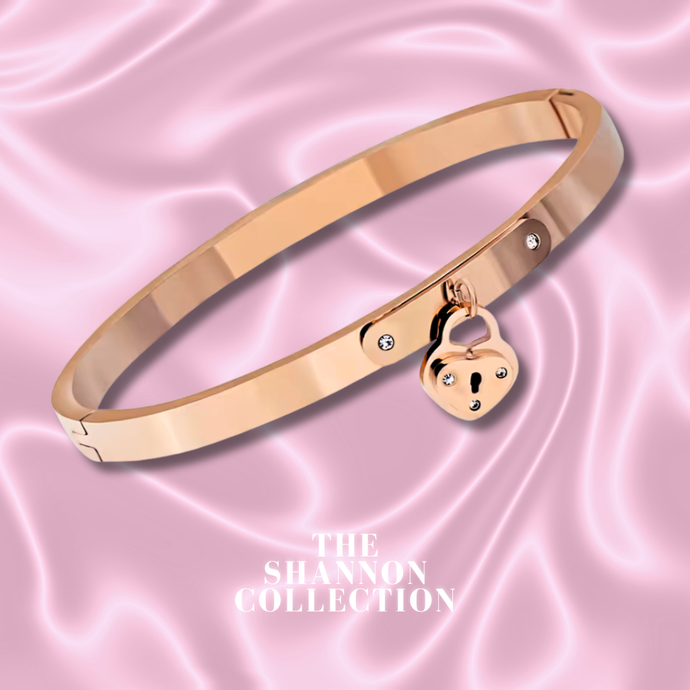 'HEART KEEPER’ 18K ROSE GOLD PLATED STAINLESS STEEL BANGLE