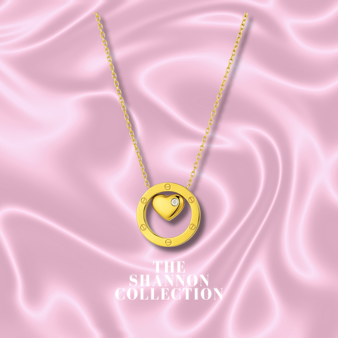 'CAPTURED HEART’ 18K GOLD PLATED STAINLESS STEEL NECKLACE